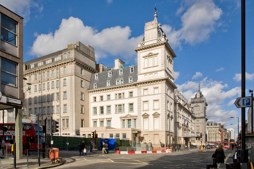 Hilton Hotel & Praed Street, Paddington station 
 Unlike many of the fine station termini in London, Paddington does not boast a grandiose frontage for all to see and admire. Similar to St. Pancras a short distance away along Marylebone and Euston Roads Paddington is fronted by a hotel. Built in a classical and French-chateau style, the hotel was opened in the summer of 1854 by Prince Albert and was named The Great Western Hotel. It operated under this name until 1983 when it was sold off by BR to be comprehensively refurbished and opened as the Hilton London Paddington in 2001. 
 Keywords: Hilton Hotel Praed Street Paddington station