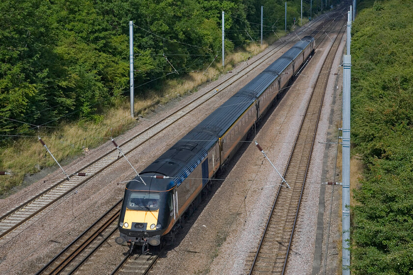 43484, GC 08.30 Sunderland-London King's Cross (1A61), Westby SK96227 
 Grand Central's 43484 Peter Fox 1942-2011 Platform 5 leads a short HST set down Stoke Bank working the 08.30 Sunderland to King's Cross. I stood at a very similar spot in August 1978 but the subject then was 55009 'Alycidon'...see... https://www.ontheupfast.com/p/21936chg/25410357404/x55009-14-13-york-london-king-s-cross 
 Keywords: 43484 08.30 Sunderland-London King's Cross 1A61 Westby SK96227 Grand Central HST Peter Fox 1942-2011 Platform 5