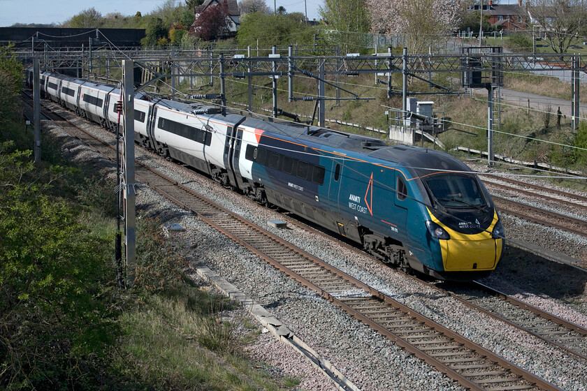 390011, 14.15 Manchester Piccadilly-London Euston (1A41, 1E), site of Roade station 
 Later in the afternoon, the weather had perked up and I ventured out again. 390011 'City of Lichfield' passes the site of Roade station working the 1A41 Avanti West Coast 14.15 Manchester to Euston service. 
 Keywords: 390011 14.15 Manchester Piccadilly-London Euston 1A41 site of Roade station Avanti West Coast Pendolino City of Lichfield