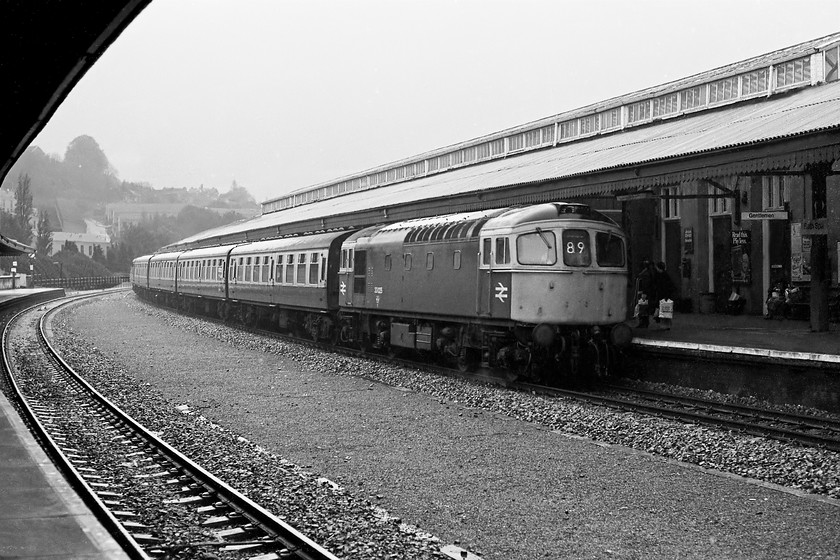 33025, unidentified Cardiff Central-Portsmouth Harbour working, Bath Spa station 
 Whilst headcodes had disappeared from the front of trains from the start of 1976 the Southern Region persisted in using their two-digit numeric system. Correctly displaying its 89 coding 33025 arrives at a very wet Bath Spa station leading a Cardiff (or more likely Bristol) to Portsmouth Harbour service. This particular Class 33 is still in use on the network being painted maroon and operated by West Coast Railway, see..... https://www.ontheupfast.com/p/21936chg/26118464804/x33025-steam-dreams-excursion-07 
 Keywords: 33025 Bristol Temple Meads Cardiff Central-Portsmouth Harbour working Bath Spa station