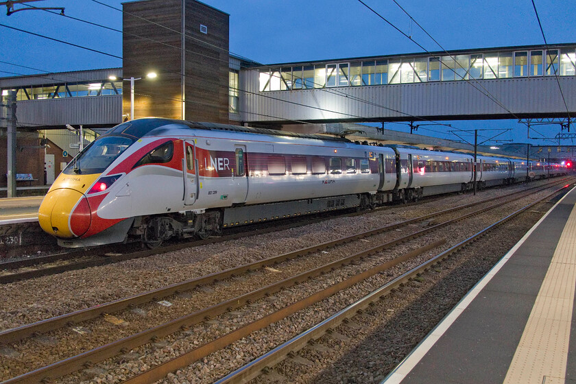 801209, GR 19.30 London King's Cross-Edinburgh (1S32, 19L), Peterborough station 
 Azuma 801209 pauses at Peterborough station working the last down Anglo-Scottish service of the day, the 19.30 King's Cross to Edinburgh. 
 Keywords: 801209 19.30 London King's Cross-Edinburgh 1S32 Peterborough station LNER Azuma