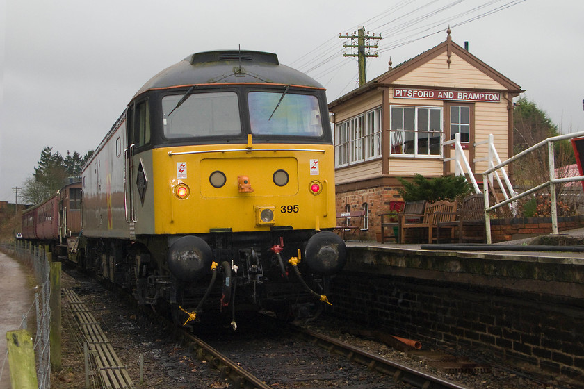 47205, 13.00 ex Pitsford & Brampton station, Pitsford & Brampton station 
 47205 waits at the head of the 13.00 Pitsford and Brampton return working to leave Pitsford station with one of New Year's Day mince pie specials. 47205 emerged from Crewe works and into traffic on 24.07.65 and survived in traffic until withdrawal on 31.12.04 and after purchase from C. F. Booths it was transported to the Northampton and Lamport Railway in December 2007. 
 Keywords: 47205 13.00 Pitsford & Brampton station Pitsford & Brampton station