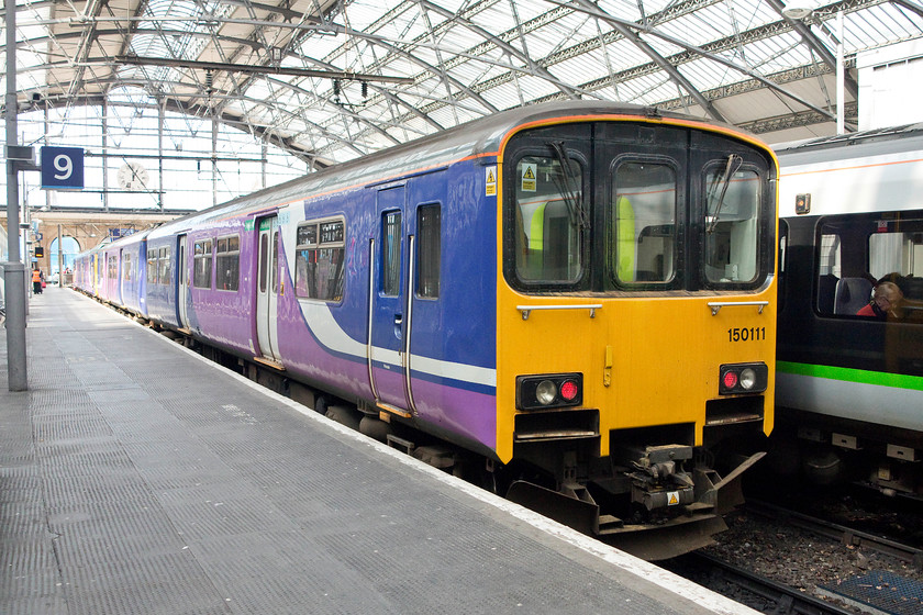 150111 & 142045, NT 13.27 Liverpool Lime Street-Manchester Oxford Road (2H40), Liverpool Lime Street station 
 A Northern Trains combination at Lime Street's platform nine waits to leave with the 13.27 to Manchester Oxford Road. It is composed of 150111 and at the rear, 142045. 
 Keywords: 150111 142045 13.27 Liverpool Lime Street-Manchester Oxford Road 2H40 Liverpool Lime Street station