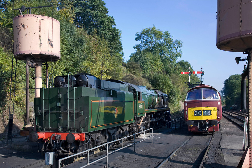 34027, stabled & D1062, 15.23 Kidderminster-Bridgnorthm, Bewdley station 
 No work for ex SR 4-6-2 Pacific 34027 'Taw valley' on the SVR today as it's a diesel gala long weekend! It sits in a siding at Bewdley station as D1062 'Western Courier' arrives with the 15.23 Kidderminster to Bridgnorth service. Purists will lament the lack of steam operations on a high profile heritage line such as the SVR but there is a genuine and loyal following for early diesels that brings the punters in and fills the tills! 
 Keywords: 34027, stabled & D1062, 15.23 Kidderminster-Bridgnorthm, Bewdley station Taw Valley Western Courier Southern Railway West Country class 4-6-2 Pacific