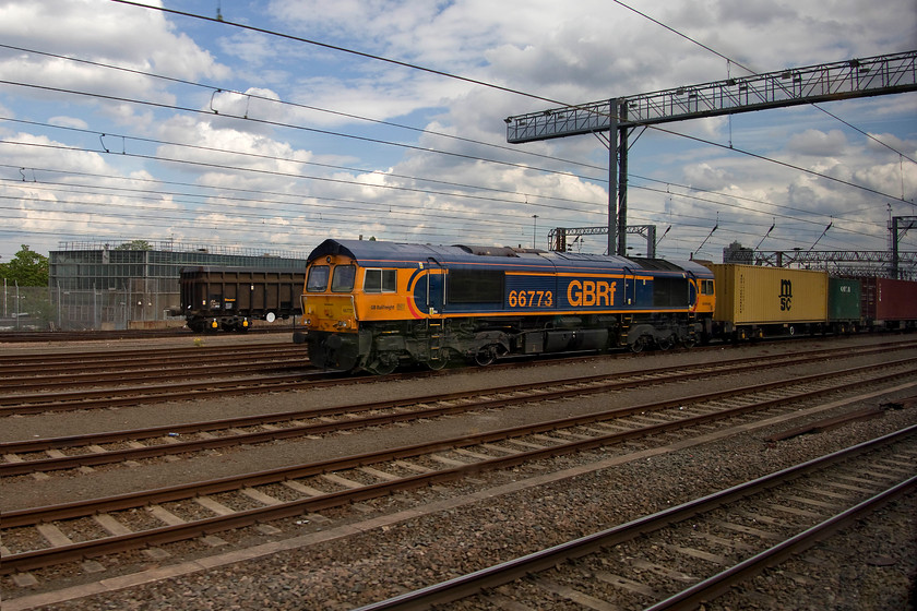 66773, 11.55 London Gateway-Hams Hall (4M45), Wembley Yard 
 On passing Wembley Yard, GBRF's 66773 is seen waiting to continue its journey north with the 11.55 London Gateway to Hams Hall Freightliner. 
 Keywords: 66773 11.55 London Gateway-Hams Hall 4M45 Wembley Yard