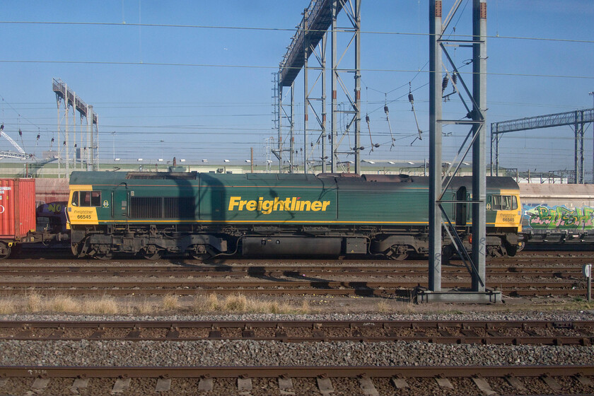 66545, 07.00 Crewe Basford Hall-London Gateway (4L59, RT), Wembley Yard 
 Having viewed my second prospective purchase in Finchley which was a decidedly better example than the car seen in Watford earlier I head back toward my final stop of the day at Kings Langley. As my train passes Wembley Yard I managed this broadside photograph of 66545. It had arrived a little earlier and was now on a pretty lengthy layover leading the 4L59 07.00 Basford Hall to London Gateway Freightliner service. 
 Keywords: 66545 07.00 Crewe Basford Hall-London Gateway 4L59 Wembley Yard Freightliner