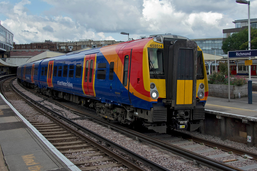 458514, SW 09.23 Windsor & Eton Riverside-London Waterloo (2U22, RT), Richmond station 
 458514 comes to a halt at Richmond station working the 09.23 Windsor and Eton Riverside to Waterloo service. I think that the livery of that Southwest trains applied to these units was smart, this one still wears its old operators livery with South Western Railway branding. The 458 units are now extremely reliable having had an extensive overhaul and re-configuration following legendary unreliability issues some years ago. 
 Keywords: 458514 09.23 Windsor & Eton Riverside-London Waterloo 2U22 Richmond station