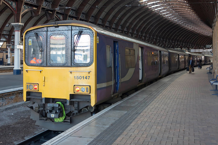 150147, NT 13.11 York-Leeds (2C33), York station 
 The fifth and final train of our trip from Northampton to Knaresborough waits to leave York station. 150147 will work the 13.11 to Leeds that Trevor and I took to Knaresborough. 
 Keywords: 150147 13.11 York-Leeds 2C33 York station