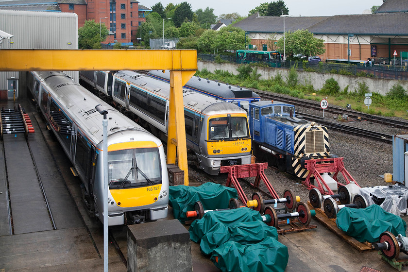 168327, 168005, 121020 & 01509, stabled, Aylesbury MPD 
 A typically busy scene at Aylesbury MPD taken from the footbridge that spans the line and affords views down into it. From left to right, 168327, 168005, 121020 and 01509 'Lesley' are all on display along with some wheel sets and other parts. 
 Keywords: 168327 168005 121020 01509 Aylesbury MPD