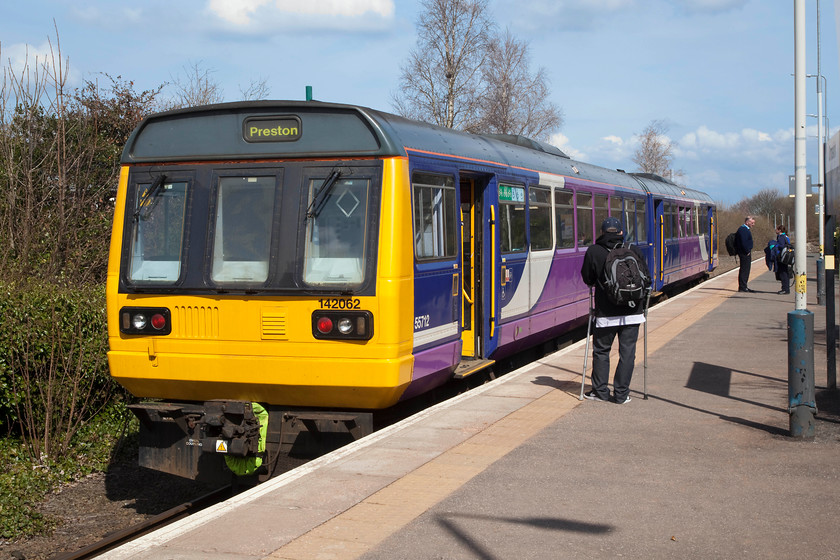 142062, NT 13.24 Ormskirk-Preston (2N01, RT), Ormskirk station 
 Northern 142062 sits at Ormskirk station waiting to work the 13.24 to Preston. I took this train to Preston and what a lovely journey it was. The trip was dominated by long sections of bullhead rail that really exploited the Pacer's poor riding characteristics with it behaving like a nodding donkey! There was also some ancient signalling to observe and it is a line that I have never travelled on before....cop! 
 Keywords: 142062 2N01 Ormskirk station