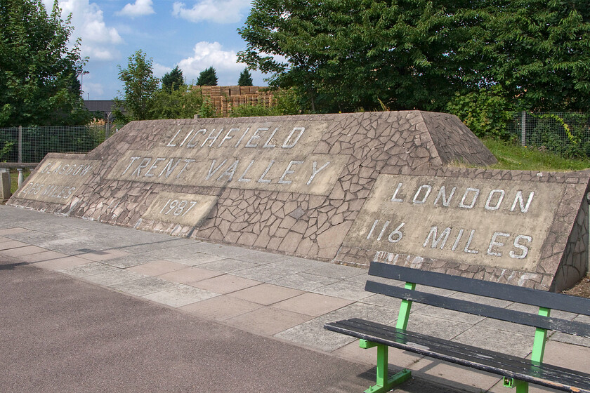 Station monument, Lichfield Trent Valley station 
 An impressively large but not particularly attractive concrete monolith looking more akin to a tombstone on Lichfield Trent Valley station. Installed in 1987 when the station was extensively remodelled it proclaims that the station is one hundred and sixteen miles from London with another two hundred and eighty-five to go to Glasgow. 
 Keywords: Station monument Lichfield Trent Valley station