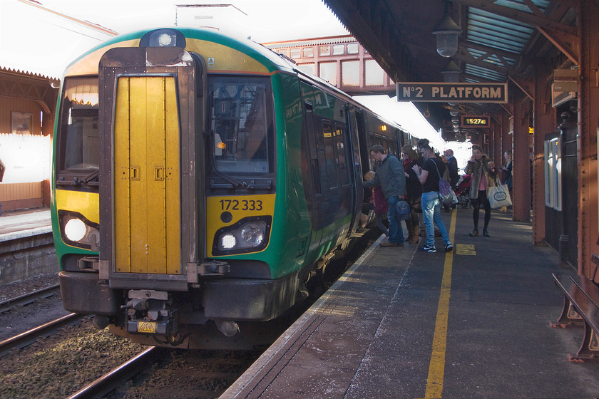 172333, LM 15.09 Dorridge-Kidderminster (2K45), Birmingham Moor Street station 
 Birmingham Moor Street station is has been superbly restored in the best spirit of the GWR. It is painted in traditional colours and with reproduction signage as seen in this image. 172333 is just coming to a halt at platform two with the 15.09 Dorridge to Kidderminster working. As can be seen in this image, the extreme contrast on this bright afternoon has caused some problems with the exposure. 
 Keywords: 172333 15.09 Dorridge-Kidderminster 2K45 Birmingham Moor Street station