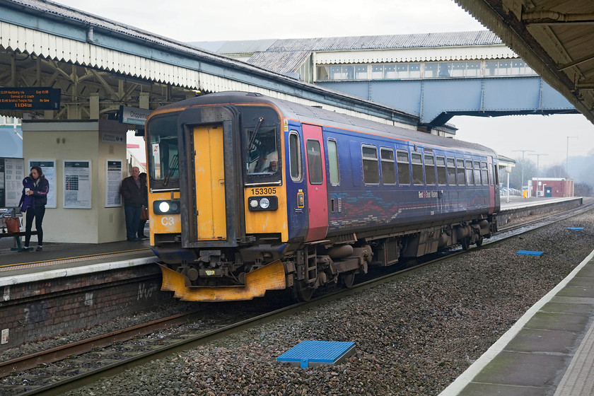 153305, GW 10.47 Swindon-Westbury (2M07, 1E), Chippenham station 
 Chippenham station retains quite a number of its original GWR features as built. Despite loosing its down fast line in 1976 it is still busy and, if anything could do with this line reinstating at peak times. 153305 pauses at platform two working the 2M07 10.47 Swindon to Westbury working. 
 Keywords: 153305 2M07 Chippenham station