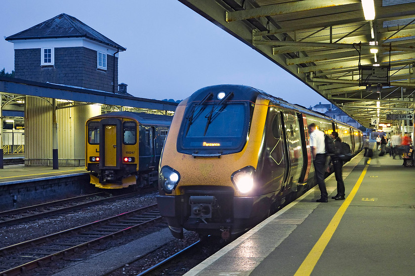 150247, stabled & 220028, XC 11.00 Glasgow Central-Penzance (1V62, 69L), Plymouth station 
 Any passengers still aboard Cross Country's 11.00 Glasgow Central to Penzance should have already arrived at their destination! Here at Plymouth, 220028 is over an hour late and there will be passengers busy filling in their delay-repay forms! There were numerous problems with all trains heading west on this day caused, largely, by the break in the extremely hot weather that culminated in torrential rain and thunderstorms. Behind the Voyager, 150247 sits stabled ready for work next day. 
 Keywords: 150247 220028 1V62 Plymouth station