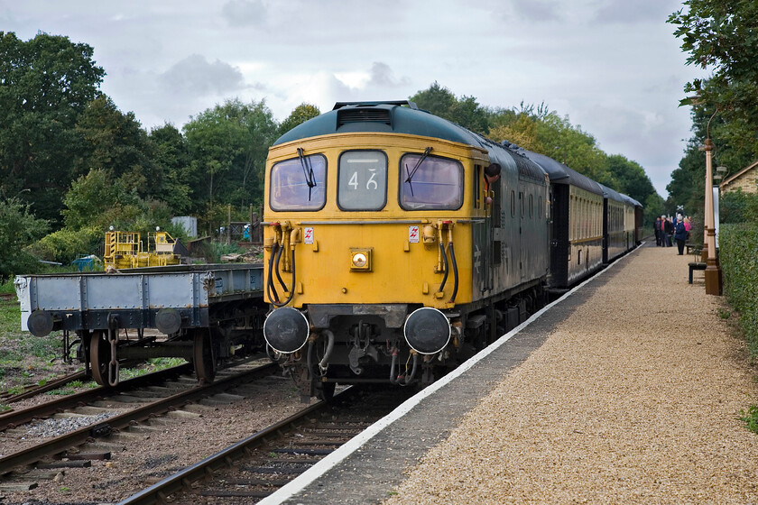 33108, 10.42 Wansford-Peterborough Nene Valley (1E46), Ferry Meadows station 
 Another visiting locomotive to join a number that had arrived for the Nene Valley's autumn diesel gala arrives at Ferry Meadows hauling the 10.42 Wansford to Peterborough Nene Valley.33108 is one of a small number of Class 33s that were converted for push-pull operation with 4-TC sets between Waterloo and Weymouth. It is identified by its jumper cables that do rather clutter up the front of the locomotives that are otherwise of a clean and pleasant design (in my eyes at least!). 
 Keywords: 33108 10.42 Wansford-Peterborough Nene Valley 1E46 Ferry Meadows station.jpg