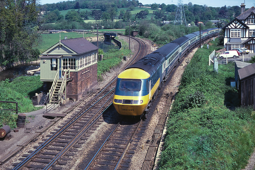 253021, 09.25 London Paddington-Penzance, Cowley Bridge Junction 
 I would probably have cursed the HST working the 09.25 Paddington to Penzance as it came around the curve at Cowley Bridge Junction as I was hoping for a Class 50 or at worst a 47! However, I am pleased that I did take a photograph of 253021 as some forty years on HSTs have now disappeared from this route along with the superb signal box and semaphores. The black and white timbered New Inn is still there and trading but I suspect that most of the cars in its car park including a Mini van and a Mk.I VW Scirocco have all gone to the great car graveyard. 
 Keywords: 253021 09.25 London Paddington-Penzance Cowley Bridge Junction HST