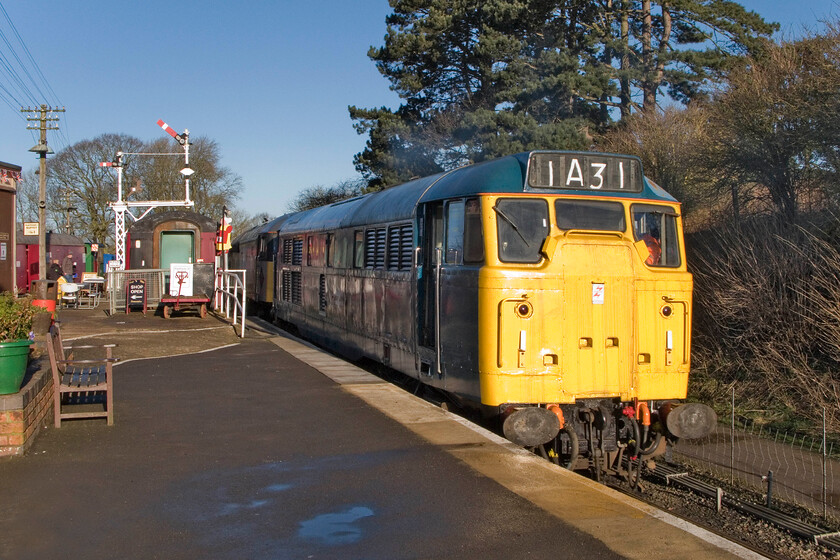 31289 & 47205, shunting stock into sidings, Pitsford & Brampton station 
 Rather optimistically wearing a 1A31 headcode (a London Paddington express working from the West Country or South Wales) 31289 has just been started up and is reversing 47205 and a short rake of vans back towards the sidings at Pitsford and Brampton station. Hopefully, after this but of 'Railway Tetris' the stock for the New Year's Day mince pie specials will be able to get under way! 
 Keywords: 31289 47205 Pitsford & Brampton station