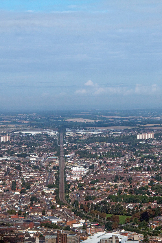 Luton & MML, from flight VY0623 
 The MML stretches out for some way in a straight line north of Luton with Leagrave station in the middle distance. The image is taken from flight VY0623 from London Luton to Florence. 
 Keywords: Luton MML from flight VY0623