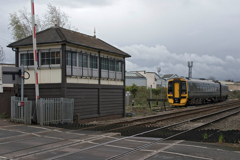 158767, GW 09.07 Cheltenham-Gloucester Locomotive Spur (5G81, 6E), Alstone Lane crossing 
 Just moving away from its stabling point adjacent to Altone Crossing signal box 158767 forms the 5G81 ECS to Gloucester. The signal box in this photograph is an interesting survivor dating from the Midland Railway days being constructed in 1891. Today it contains an IFS panel and monitors the three-level crossings in the Cheltenham area. There appear to be no plans at present for its closure. 
 Keywords: 158767 09.07 Cheltenham-Gloucester Locomotive Spur 5G81 Alstone Lane crossing GWR