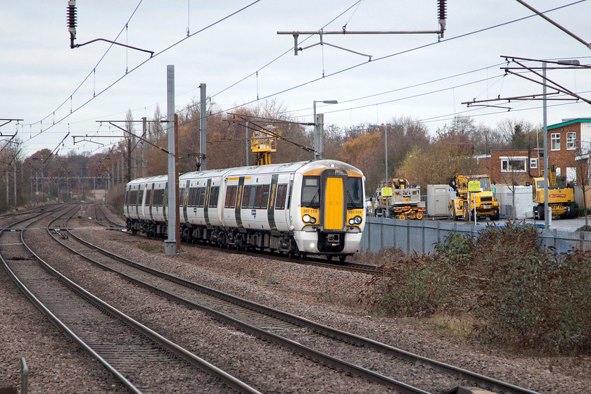 387119, 08.10 Peterborough-London King`s Cross (1P09), Potters Bar station 
 387117 arrives at Potters Bar with the Great Northern 08.10 Peterborough to King's Cross service. Winter has come late during this year with the trees in the background still hanging on to their brown leaves even by the start of December. 
 Keywords: 387119 08.10 Peterborough-London King`s Cross 1P09 Potters Bar station