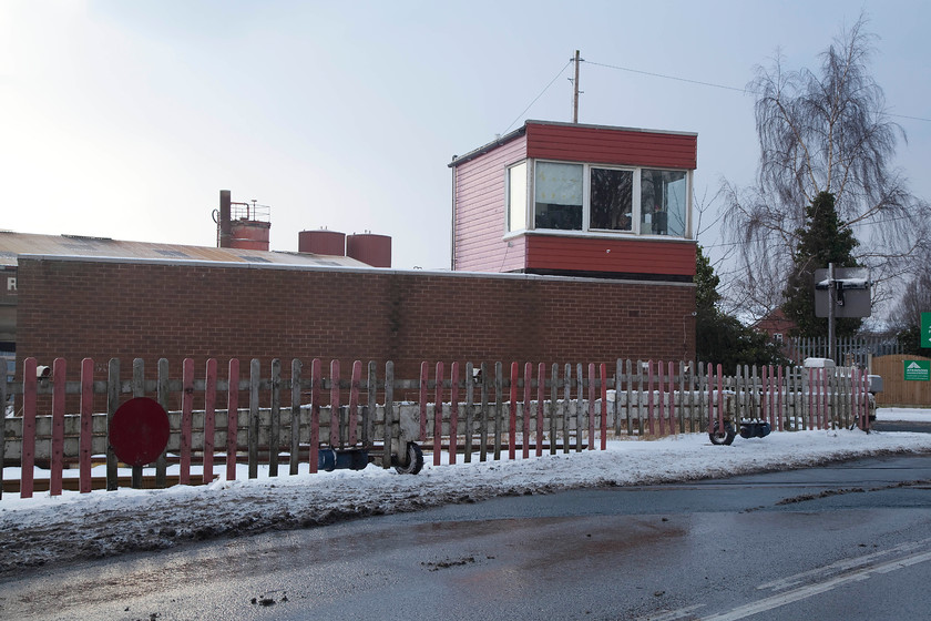 Cutsyke signal box (BR, 1975) 
 Constructed by British Rail in 1975, Cutsyke signal box is going to win no prizes in the design stakes. It controls the crossing over the busy A369 road just south of Castleford town. The gates are of the electrical wheel boom type that, at the time of writing, there are just three remaining on the network. Despite the weather conditions, they appear to have worked well. 
 Keywords: Cutsyke signal box