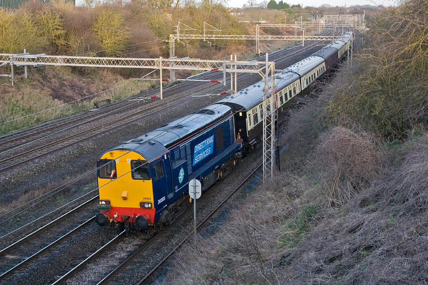 20303, outward leg of The Buffer Puffer 11.1, 05.02 Stafford-London area (1Z57), Victoria bridge 
 The Buffer Puffer series of railtours have become incredibly popular with rare line bashers getting them to tracks and routes that are usually off-limits to passenger workings. This version named The Buffer Puffer 11.1, left Stafford and an unearthly 05.02 with 20303 leading the train with 20304 on the rear. Heading for the London area the train is seen passing Victoria bridge just south of Roade on the southern WCML. 
 Keywords: 20303 The Buffer Puffer 11.1 05.02 Stafford-London area 1Z57 Victoria bridge