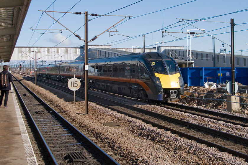 180105, GC 06.45 Sunderland-London King's Cross, Peterborough station 
 A second 'wrong side' image Adelante 180105 passing Peterborough at full speed. It was working Grand Central's 06.45 Sunderland to King's Cross service. It would be nice if this fledgling TOC, even if it is a subsidiary of Arriva UK Trains, could lease some nice new dedicated trains to operate its services rather than old and rather unreliable hand-me-downs such as these and some HST sets. 
 Keywords: 180105 06.45 Sunderland-London King's Cross Peterborough station GRand Central