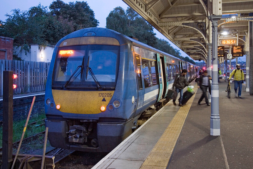 170205, LE 15.50 Lowestoft-Norwich, Norwich station 
 Passengers alight from 170205 having just arrived and terminated working the 15.50 from Lowestoft. The train is seen in the shorter platform six which is located at the far east side of Norwich station from where it will soon work back to the coast as an evening commuter service. 
 Keywords: 170205 15.50 Lowestoft-Norwich Norwich station Greater Anglia