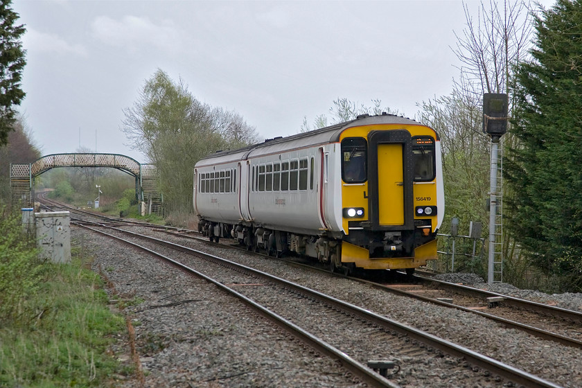 156419, LE 10.46 Sheringham-Norwich (2S11), Girling's level crossing TG264083 
 Girling's level crossing is located between Wensum Junction (to the immediate east of Crown Point) and where the Sherringham branch diverges at Whitlingham Junction. The 10.46 Sheringham to Norwich service has just joined the mainline at the latter of the two junctions just past the footbridge with 156419 working the train. 
 Keywords: 156419 10.46 Sheringham-Norwich 2S11 Girling's level crossing TG264083 Abellio Greater Anglia