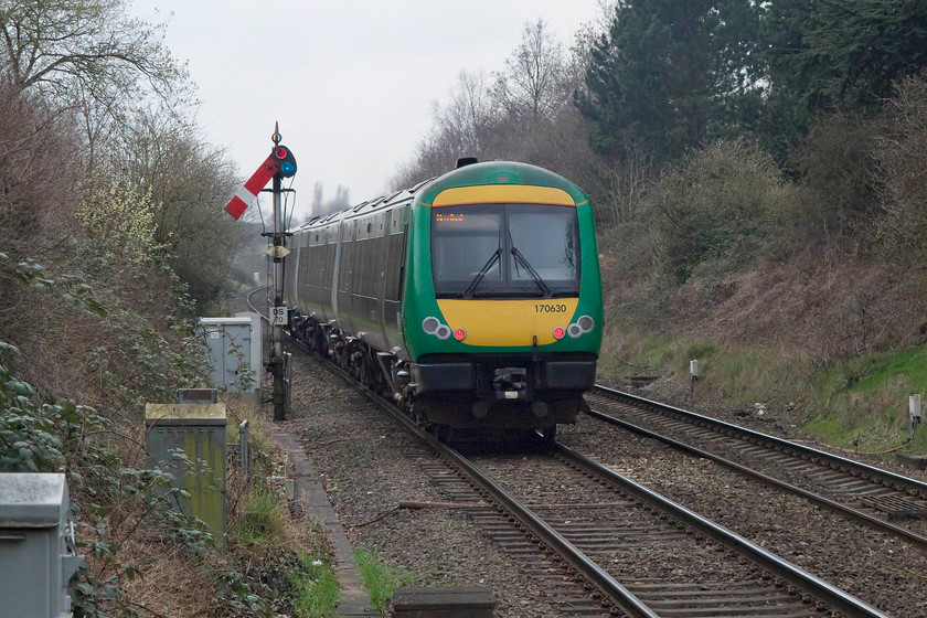 170630, LM 12.49 Birmingham New Street-Hereford (1V27, 2L), Droitwich station 
 170630 leaves Droitwich Spa having been given the road by the box pulling off the up starter. I had travelled on this service from Birmingham New Street. 
 Keywords: 170630, LM 12.49 Birmingham New Street-Hereford (1V27, 2L), Droitwich station