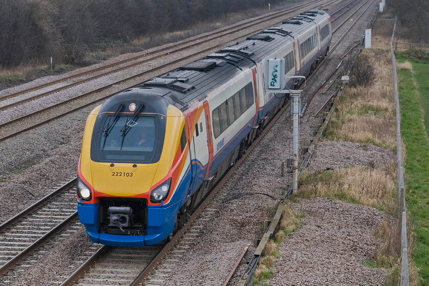 222103, EM 12.55 London St. Pancras-Sheffield, Lower Farm Road, Bromham TL028518 
 With The Enigmatic Logistician charter now running very late and news filtering through of a problem it's time to prepare to head for home. 222103 heads northwards working EMR's 12.55 St. Pancras to Sheffield 'fast' service. Notice the graffiti vandalism on the back of the signal, who and why? 
 Keywords: 222103 12.55 London St. Pancras-Sheffield Lower Farm Road Bromham TL028518 EMR Meridian