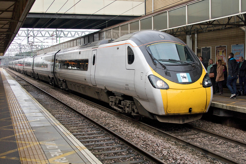 390039, VT 08.17 Preston-London Euston (9M48, 2L), Milton Keynes Central station 
 390039 is always easily identified due to the unusual crest on the front of the cabs. It is the flag of Coventry with an image of one of the city's most famous residents, Lady Godiva. The Avanti West Coast service is slowing for its stop at Milton Keynes with the 9M48 08.17 Preston to Esutom service. 
 Keywords: 390039 08.17 Preston-London Euston 9M48 Milton Keynes Central station Pendolino Avanti West Coast