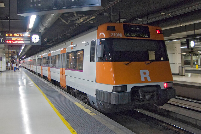 447 210, Rodalies 17.36 Barcelona-Sants-Martorell, Barcelona-Sants station 
 Wearing its Rodalies livery, 447 210 waits at Barcelona's Sants station to work the 17.36 service to Martorell a town inland from Barcelona better known for the huge Seat factory. Rodalies de Catalunya, to give its full name, is a state-owned regional and commuter operator. It operates a number of the Class 447s that, whilst not having a very high maximum speed are well known for their spirited acceleration! 
 Keywords: 447 210 Rodalies 17.36 Barcelona-Sants-Martorell Barcelona-Sants station