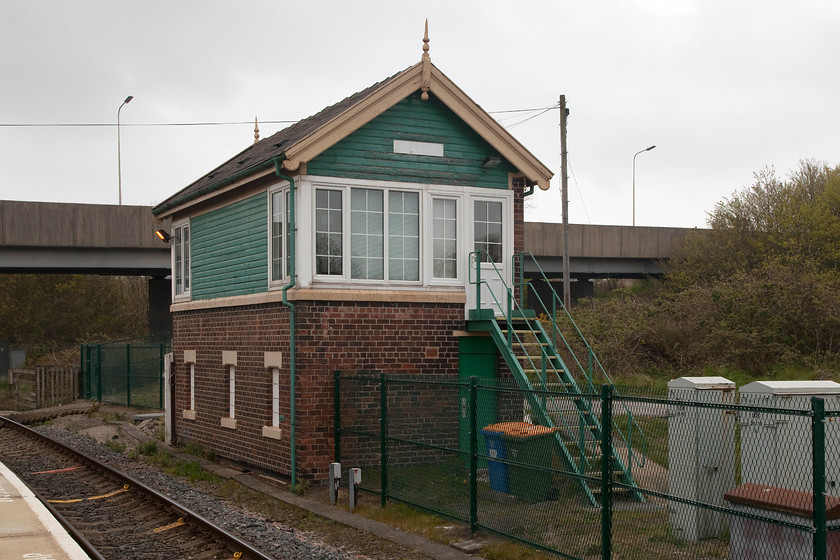 Seamer signal box (NE, 1910) 
 Looking very smart having had a lick of paint, Seamer signal box is seen from the station platform. This box was built by the North Eastern in 1910 and was constructed within a few feet of the much earlier York and North Midland box. Rather bizarrely, for many years the boxes stood side by side until the earlier structure was demolished in the 1970s. 
 Keywords: Seamer signal box