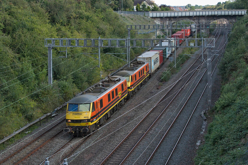 90016 & 90007, 11.13 Felixstowe North-Ditton (4M87, 9E), Hyde Road bridge 
 Whilst 90016 has been a Freightliner locomotive for many years now, 90006 (second in line) is a relative newcomer to the freight operator previously being a GA Great Eastern Mainline locomotive, see... https://www.ontheupfast.com/p/21936chg/29305379404/x90007-15-00-norwich-london-liverpool The pair, now matching in their smart DB Cargo livery, pass through Roade working the 11.13 Felixstowe to Ditton service. 
 Keywords: 90016 90007 11.13 Felixstowe North-Ditton 4M87 Hyde Road bridge