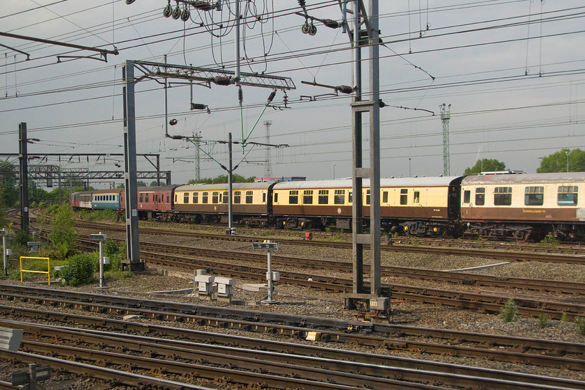 Various coaching stock, Crewe South 
 A motley collection of coaching stock sits rather forlornly at Crewe South awaiting restoration or, more than likely, stripping for parts to keep other coaches in use. 
 Keywords: Various coaching stock Crewe South