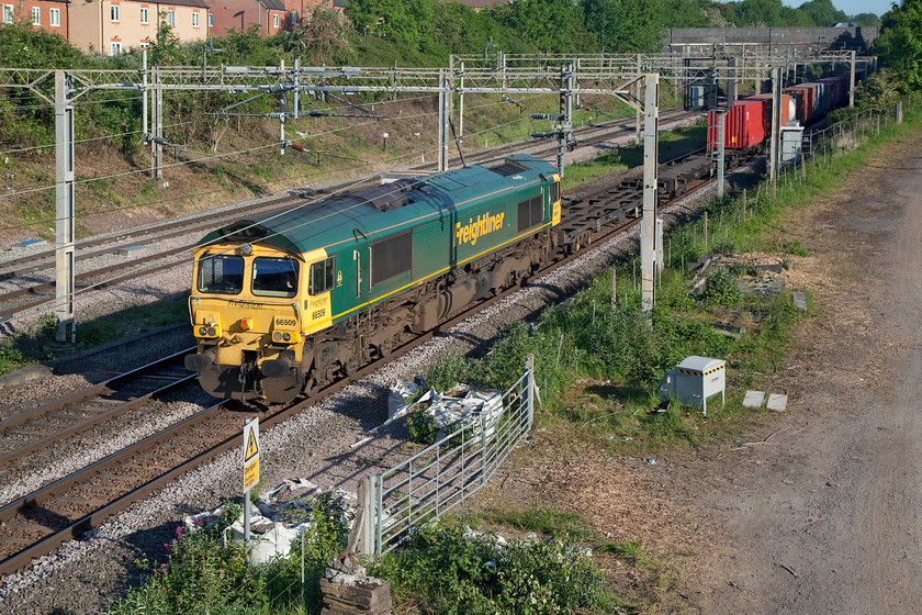 66509, 03.39 Garston-London Gateway (4L32, 24E), site of Roade station 
 66509 bursts out into the sunshine from Roade cutting leading the 03.39 Garston to London Gateway Freightliner. I have precious few photographs of this particular Class 66. In fact, the only other time that I have an image of it was at Taunton in 2015 and, even then, it was as a light engine and in tricky lighting. See ..... https://www.ontheupfast.com/p/21936chg/28610908404/x66509-up-light-engine-taunton-station 
 Keywords: 66509 03.39 Garston-London Gateway 4L32 site of Roade station Freightliner