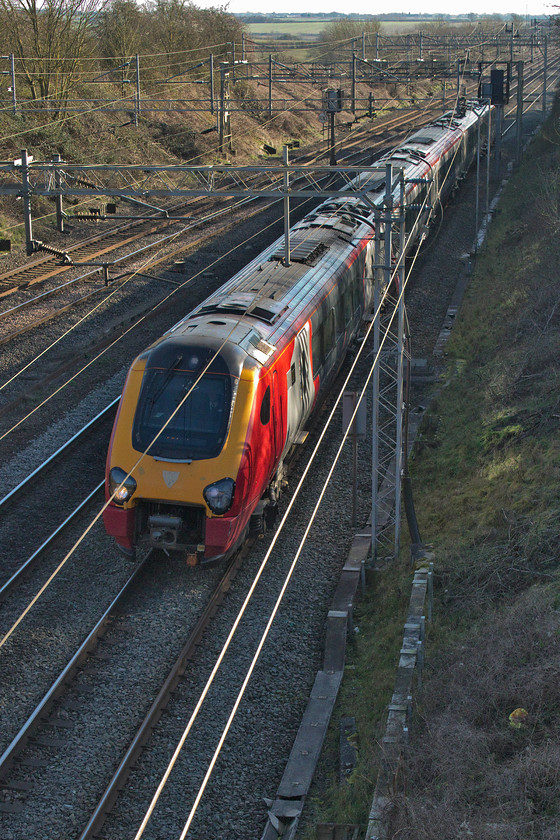 Class 221, VT 12.43 London Euston-Edinburgh Waverley (9S70, 32L), Victoria bridge 
 An unidentified Class 221 Voyager passes Victoria bridge on the WCML just south of Roade with the 12.43 Euston to Edinburgh Waverley. These units are in their final two years of operation on this route with the new operator Avanti having ordered some bi-mode units the same as are now in operation on the GWML and the ECML. 
 Keywords: Class 221, VT 12.43 London Euston-Edinburgh Waverley 9S70Victoria bridge Avanti West Coast Voyager