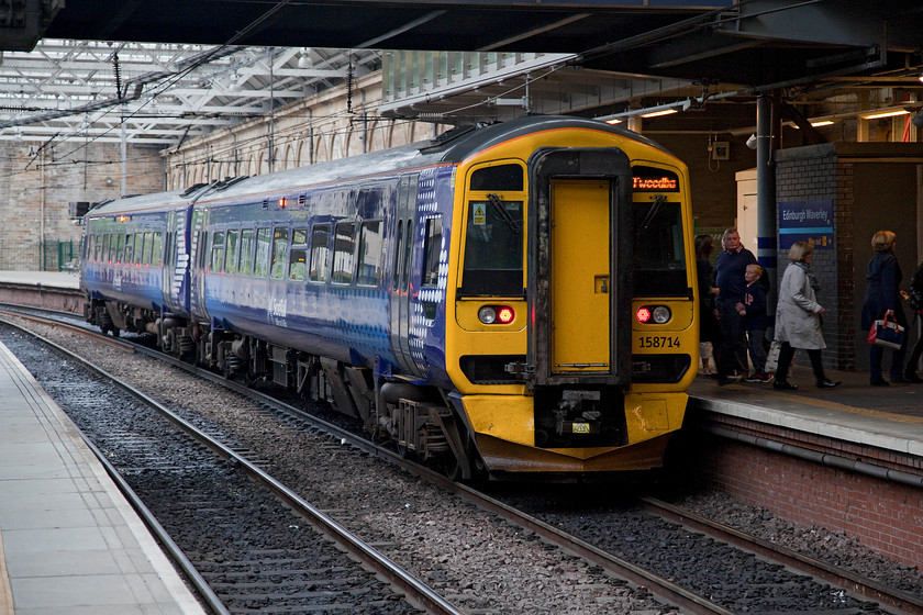 158714, SR 17.07 Glenrothes with Thornton-Tweedbank (2T56), Edinburgh Waverley station 
 158714 pauses at Edinburgh Waverley with the ScotRail 17.07 Glenrothes with Thornton to Tweedbank evening commuter working. 
 Keywords: 158714 17.07 Glenrothes with Thornton-Tweedbank 2T56 Edinburgh Waverley station