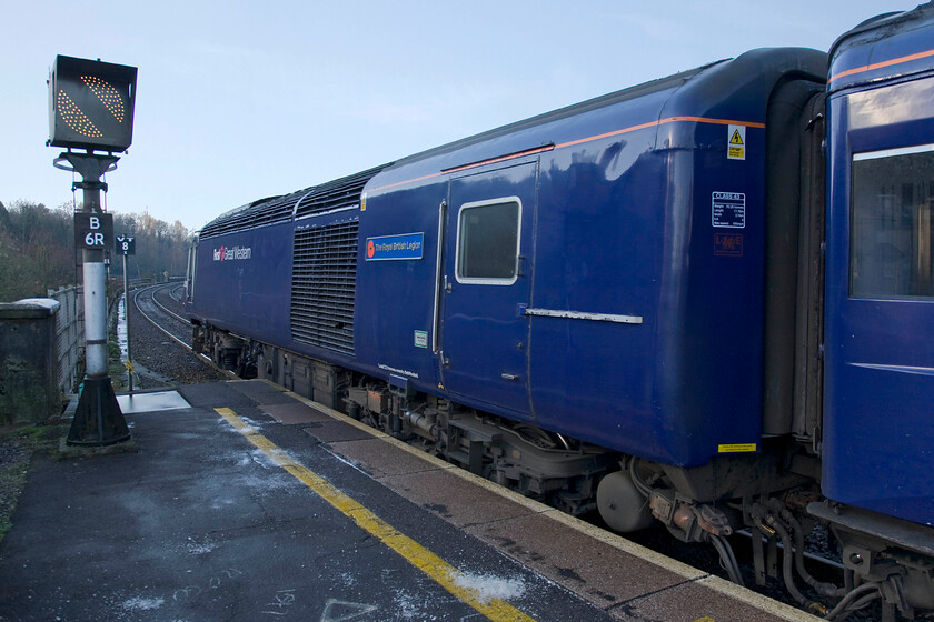 43056, GW 10.57 London Paddington-Bristol Temple Meads (1C11), Bath Spa station 
 An unorthodox view of HST power car 43056 'The Royal British Legion' as it pauses at Bath station leading the 1C11 10.57 Paddington to Bristol service. The veteran power unit was part of the pioneer East Coast set 254001 introduced in 1978. In this view the train has drawn past the B6R banner repeater signal installed due to sighting issues on the tight curve to the western end of Bath station. Now this banner signal is composed of LEDs but in the past, it was a mechanical device with a rotating arm. 
 Keywords: 43056 10.57 London Paddington-Bristol Temple Meads 1C11 Bath Spa station First Great Western HST The Royal British Legion