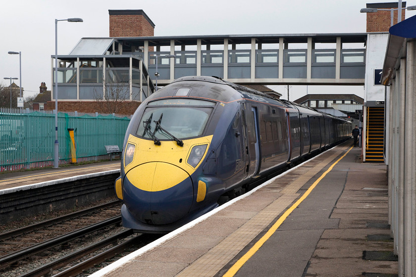 395025, SE 11.25 London St. Pancras-London St. Pancras (1C26, 3L), Sittingbourne station 
 Javelin 395025 pauses at Sittingbourne station working the 1C26 11.25 out and back St. Pancras service. Sittngborune station is another that has had a major amount of work including the vast footbridge that can be seen above the train. 
 Keywords: 395025 1C26 Sittingbourne station