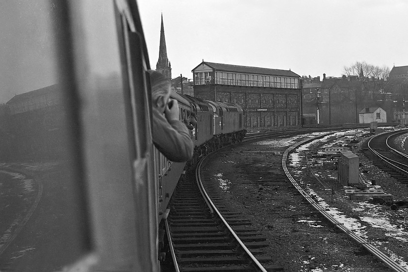 40113 & 40144, outward leg of The Crewe Campaigner Relief, 07.35 London Paddington-Crewe (1Z68), Severn Bridge Junction 
 The eastern approach to Shrewsbury is dominated by Severn Bridge Junction signal box. The huge LNWR box is still in use today (2019) and I have visited it on a number of occasions. 40113 and 40144 are leading The Crewe Campaigner Relief railtour that was running as 1Z68 from Paddington to Crewe. The equally impressive spire of St. Mary the Virgin occupies the skyline. 
 Keywords: 40113 40144 The Crewe Campaigner Relief 07.35 London Paddington-Crewe 1Z68 Severn Bridge Junction