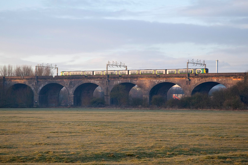 Class 350, LN 06.14 Birmingham New Street-London Euston (1Y04), Haversham SP818425 
 With early morning sun glinting on the side of the class 350 and Haversham Viaduct you can almost feel the cold nip in the air! The 350 formed the 06.14 from Birmingham New Street to London Euston was slowing for its stop at Wolverton station about a third of a mile to the left of the picture. 
 Keywords: Class 350 1Y04 Haversham