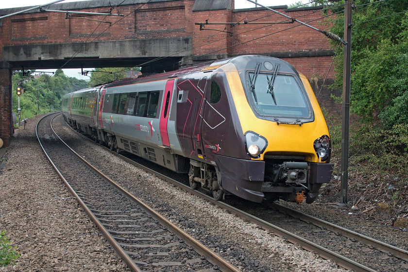 220021 (& 220010), XC 05.25 Plymouth-Newcastle (1S37, RT), Outwood station 
 CrossCountry's 220021 and 220010 (out of sight on the rear) left Plymouth with the 1S37 to Newcastle five minutes before I got up on this particular morning. In the time it has taken to get here to Outwood in West Yorkshire, I have had my breakfast, done some work on this website, driven to this location and had a cup of mediocre flask coffee on the platform! The Voyager has travelled three hundred and twenty-three miles whilst I did a mere one hundred and twenty in my wife's Range Rover! Harsh as it is to say being a railway fanatic, I think that I would take a journey in her car over one in a dreadful smelly Voyager! 
 Keywords: 220021 220010 05.25 Plymouth-Newcastle 1S37 Outwood station Crosscountry Voyager