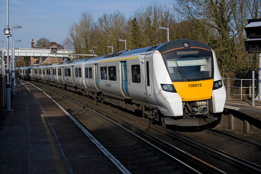 700012, TL 13.42 London Blackfriars-Sevonoaks (9Y32, RT), Eynsford station 
 700012 pauses at Eynsford station with the 13.42 Blackfriars to Sevonoaks Thameslink service. Notice that the platforms are constructed in the typical SR style being of pre-fabricated concrete. Until recently there was also a matching footbridge but this has been replaced by the white monstrosity seen spanning the line over the rear of the train. 
 Keywords: 700012 13.42 London Blackfriars-Sevonoaks 9Y32 Eynsford station