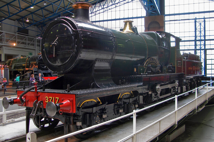 3717, preserved, NRM 
 Another of the Great Western's finest is seen preserved inside York's National Railway Museum. Initially numbered 3440 'City of Truro' became 3717 in 1911 after a partial re-build by the GWR at Swindon. I am not going to get into the 'did it-didn't it' debate as to whether it was the first locomotive to reach one hundred miles per hour now...so much has been written on the subject already. However, what a fine-looking machine dating from a time just two years after Queen Victoria died! 
 Keywords: 3717 preserved NRM National Railway Museum City of Truro