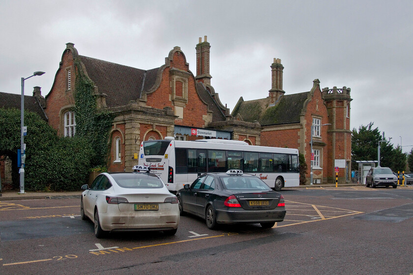 Frontage, Stowmarket station 
 The Jacobean-inspired frontage of Stowmarket station is always going to be somewhat compromised by traffic in the front car park. However, its grandeur cannot be denied being designed by the esteemed railway architect Frederick Barnes (1814-1898). It opened in 1846 and was fully restored in 1987 and is to be further improved with the installation of a new footbridge with accessibility lifts. This new and 'revolutionary' designed AVA bridge replaces the concrete version installed when the electrification of the GEML was under construction. This bridge replaced an original cast iron bridge that is now installed at Weybourne station on the North Norfolk Railway. 
 Keywords: Frontage Stowmarket station