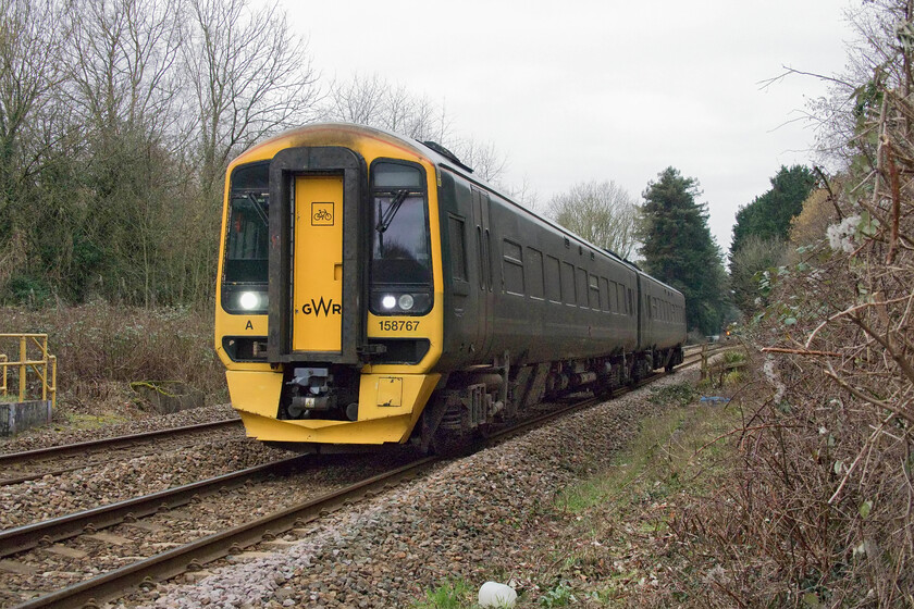 158767, GW 08.40 Gloucester-Weymouth (2O74, RT), Bradford-on-Avon no. 1 crossing ST822605 
 Taken from the safety behind some fencing on a foot crossing the 08.40 Gloucester to Weymouth service is seen approaching Bradford-on-Avon worked by 158767. Back in my young spotting days, I spent many hours at this crossing and a number of others in the vicinity for that matter collecting numbers of first-generation DMUs, Class 31s, 47s and in some cases Class 50s and HSTs on diversion. 
 Keywords: 158767 08.40 Gloucester-Weymouth 2O74 Bradford-on-Avon no. 1 crossing ST822605 GWR Great Western Railway