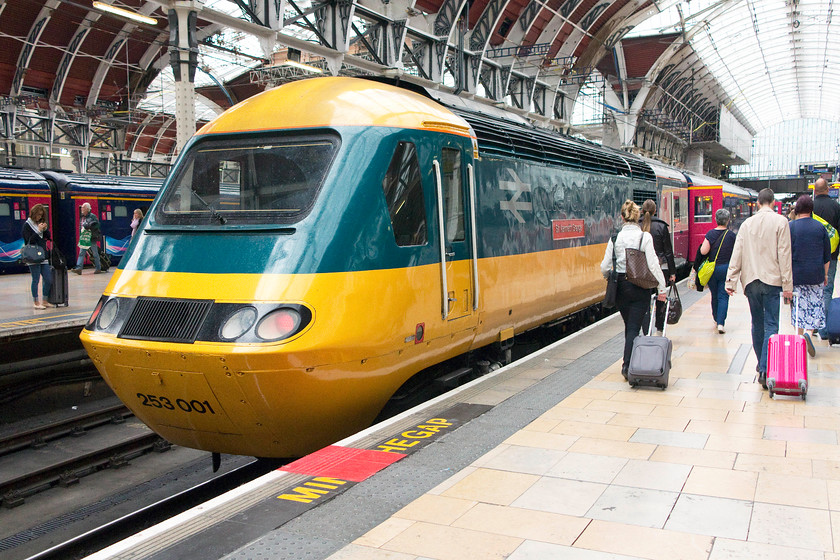 43002 (253001), GW 16.00 London Paddington-Bristol Temple Meads (1C21), London Paddington station 
 As the passengers walk to find their seats aboard the 16.00 Paddington to Bristol Temple Meads none even notice the celebrity HST power car that will be propelling them on their westward journey. This fresh paintwork is about as close as it gets to the as-built livery of 1976. Forty years ago, 253001 started thrashing up and down the GWML and what an amazing job it, and its classmates, have done since! 
 Keywords: 43002 253001 16.00 London Paddington-Bristol Temple Meads 1C21 London Paddington station