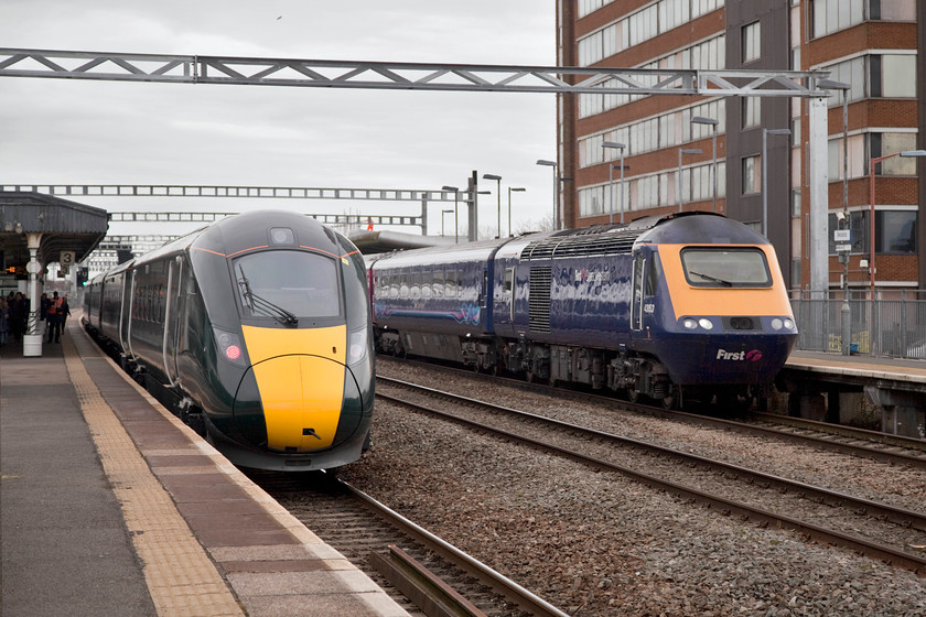 800031, GW 09.29 Swansea-London Paddington (1L48, 32L) & 43153, GW 10.30 London Paddington-WSM (1C10, 1E), Swindon station 
 I wonder in 40 years' time if the 800s will be, firstly, still in operation and, secondly, as fondly thought of as the HSTs are now? 800031 working the 09.29 Swansea to Paddington 1L48 pauses at platform 3 whilst 43153 leads the 1L48 10.30 London Paddington to Weston-super-Mare into platform 4. 43153 was an additional power car built for to bolster the Western Region's allocation in early 1981, nominally, it was part of 254033 but this set was never actually numbered. 
 Keywords: 800031 1L48 43153 1C10 Swindon_station